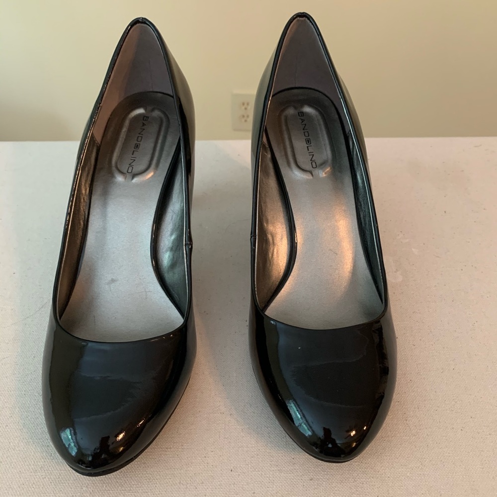 RED GEM-STUDDED HIGH PUMPS IN BLACK PATENT CALFSKIN